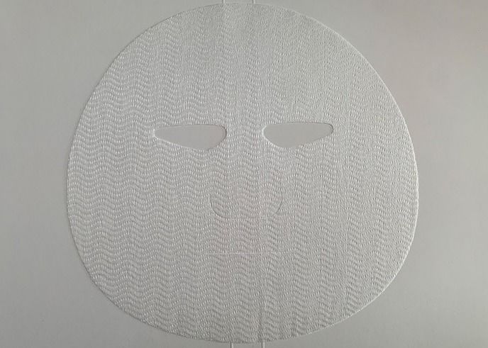 35gオーストリア人TencelのHyaluronic酸繊維のSpunlaceのNonwovenの生地の顔の美のマスク、目マスク